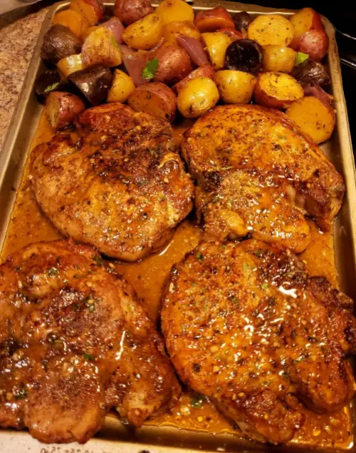 Pork chops with multi colored potatoes && red onion!